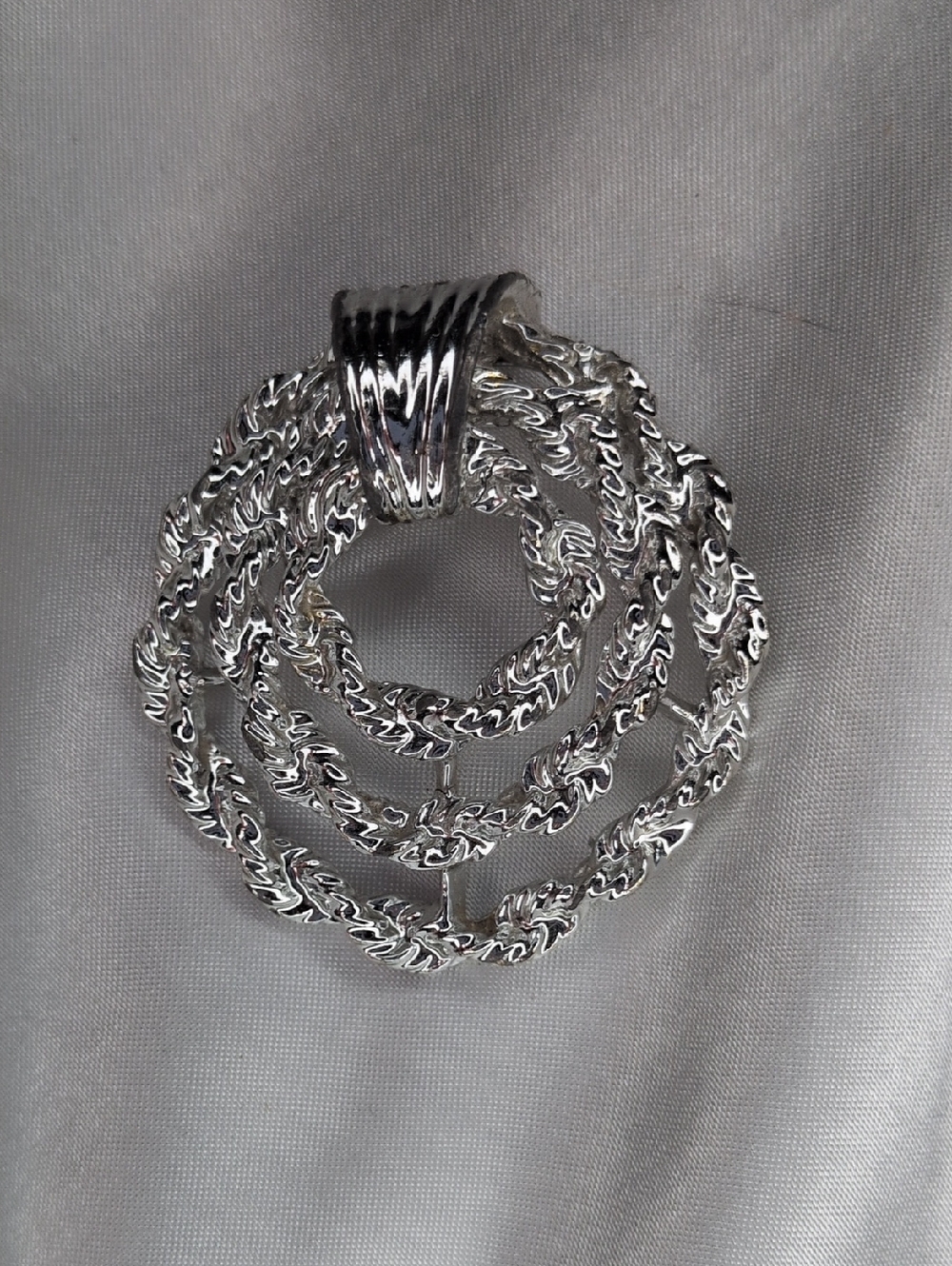 ​Vintage Gerry's Signed Silver Tone Textured Nested Wreath Spiral Brooch